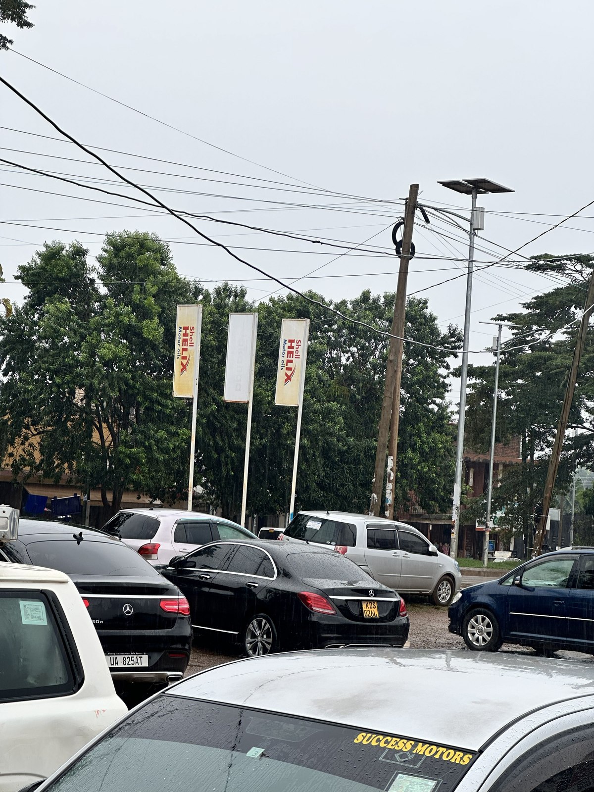 Customer vehicles parked at Makanga Auto Centre's forecourt